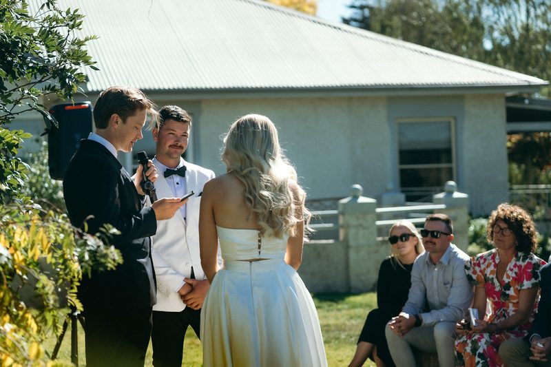 Country house ceremony in bright sunshine